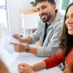 Home buyers discussing conveyancing timeline with lawyer in NSW