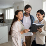 First home buyers reviewing contract with conveyancing lawyer in NSW