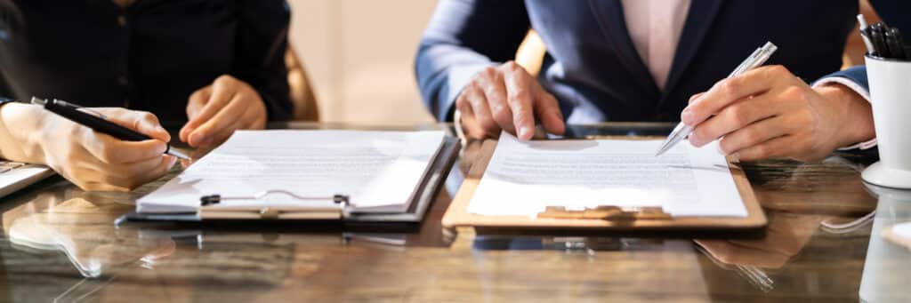 Property lawyer assisting a landlord and tenant with commercial lease negotiations in New South Wales
